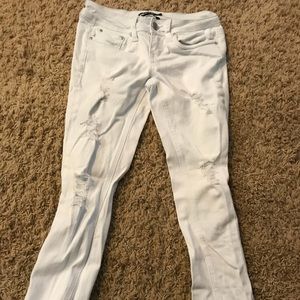 Dollhouse brand white with rips on each leg